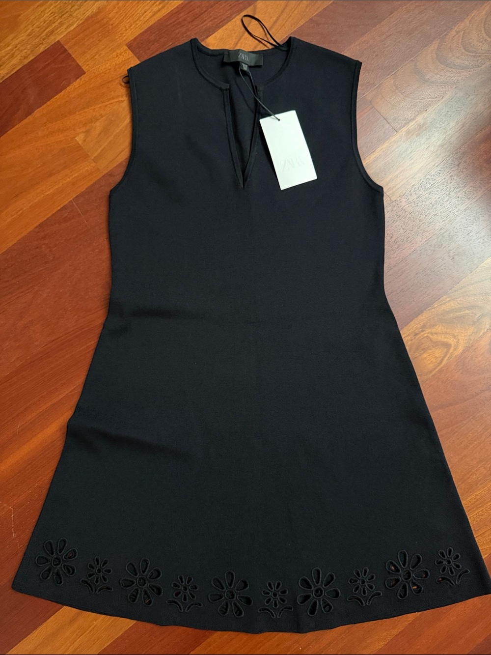 Zara Black Sleeveless Mini Dress with Floral Cutout Hem
